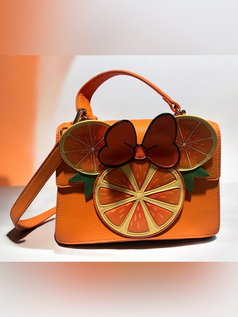 Our Universe Disney Minnie Mouse citrus themed faux leather crossbody bag.